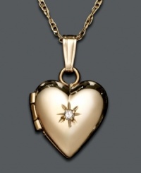 Filled with a picture of mom and dad or grandma and grandpa, give this 14k gold pendant to a deserving little girl. Heart locket features single diamond accent. Approximate length: 15 inches. Approximate drop: 1/2 inch. Filled with a picture of mom and dad or grandma and grandpa, give this 14k gold pendant to a deserving little girl. Heart locket features single diamond accent. Approximate length: 15 inches. Approximate drop: 1/2 inch.