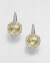 Beautifully faceted canary crystal stones set in intricately designed, sterling silver. Canary crystalsSterling silverWhite sapphiresSize, about .75Lever backImported