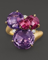 A dazzling cluster of amethyst , rhodolite and diamonds in 18K yellow gold. From Carelle. A dazzling cluster of amethyst , rhodolite and diamonds in 18K yellow gold. From Carelle.