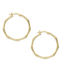 A traditional style with a trendy update. Giani Bernini's bamboo-themed hoop earrings are crafted in 24k gold over sterling silver. Approximate diameter: 30 mm. A traditional style with a trendy update. Giani Bernini's bamboo-themed hoop earrings are crafted in 24k gold over sterling silver. Approximate diameter: 30 mm.