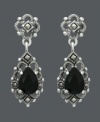 Let old world glamour inspire you. Genevieve & Grace earrings feature pear-cut onyx stones (5 mm x 7 mm) encircled by glittering marcasite in sterling silver. Approximate drop: 1 inch.