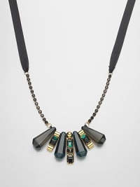 Faceted resin, sparkling stones and radiant metals come together to create a piece with a tribal-inspired design. ResinGlassBrassPolyesterLength, about 17.7Tie closureMade in Italy and imported Faceted resin, sparkling stones and radiant metals come together to create a piece with a tribal-inspired design. ResinGlassBrassPolyesterLength, about 17.7Tie closureMade in Italy and imported