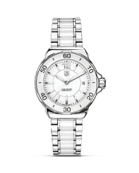 Polished ceramic and steel with deployment buckle. White dial with sapphire crystal, luminescent markers on faceted minute and hour hands. Date window at 3 o'clock. Polished ceramic and steel with deployment buckle. White dial with sapphire crystal, luminescent markers on faceted minute and hour hands. Date window at 3 o'clock.