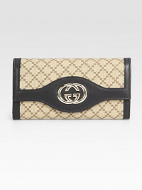 Signature logo jacquard in a foldover silhouette, finished with leather trim and GG hardware.Magnetic snap flap pocketCenter zip pocketTwo inner compartmentsThirteen credit card slotsFully lined7½W X 4H X 1¼DMade in Italy Signature logo jacquard in a foldover silhouette, finished with leather trim and GG hardware.Magnetic snap flap pocketCenter zip pocketTwo inner compartmentsThirteen credit card slotsFully lined7½W X 4H X 1¼DMade in Italy