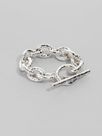 Bold links, subtly hammered, in shiny sterling silver with a chunky toggle closure. Sterling silver Length, about 8 Toggle closure Imported Bold links, subtly hammered, in shiny sterling silver with a chunky toggle closure. Sterling silver Length, about 8 Toggle closure Imported