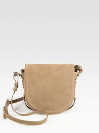 Sumptuous suede in a classic flap-saddle silhouette, finished with a versatile crossbody strap.Adjustable crossbody strap, 19-21 dropFlap closureCenter zip compartmentOne inside zip pocketFully lined7¾W X 8H X 2½DImported Sumptuous suede in a classic flap-saddle silhouette, finished with a versatile crossbody strap.Adjustable crossbody strap, 19-21 dropFlap closureCenter zip compartmentOne inside zip pocketFully lined7¾W X 8H X 2½DImported