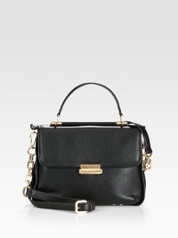 Sumptuous pebble-grain leather pairs with polished goldtone hardware in a classic flap-top satchel.Detachable top handle, 4½ dropDetachable adjustable shoulder strap, 23-24¾ dropPush-lock flap closureProtective metal feetCenter zip compartmentOne inside zip pocketTwo inside open pocketsFully lined11½W X 9H X 2DImported Sumptuous pebble-grain leather pairs with polished goldtone hardware in a classic flap-top satchel.Detachable top handle, 4½ dropDetachable adjustable shoulder strap, 23-24¾ dropPush-lock flap closureProtective metal feetCenter zip compartmentOne inside zip pocketTwo inside open pocketsFully lined11½W X 9H X 2DImported
