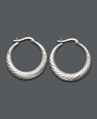 Looking for style to last a lifetime? You can never go wrong with a simple pair of hoops. Giani Bernini earrings highlight a scalloped edge in sterling silver. Approximate diameter: 1 inch. Looking for style to last a lifetime? You can never go wrong with a simple pair of hoops. Giani Bernini earrings highlight a scalloped edge in sterling silver. Approximate diameter: 1 inch.