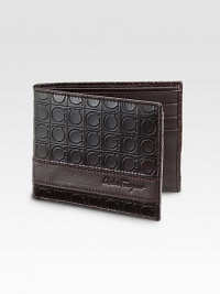 Richy crafted Italian leather, stamped with a signature gamma pattern and logo detail. Six card slots, two bill compartments 4½W X 3½H Made in Italy Richy crafted Italian leather, stamped with a signature gamma pattern and logo detail. Six card slots, two bill compartments 4½W X 3½H Made in Italy