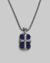 An original design pairs two sterling silver pendants on a single strand. The cross pendant is crafted with pavé diamond detail, and the larger features smooth lapis inlay. Sterling silver Pavé diamonds Lapis Pendant: 1 long Necklace: 24 long Lobster clasp closure Imported 