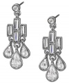 Carolee's glittering chandelier earrings are an elegant finishing touch for a weekend ensemble. Crafted with glass accents in imitation rhodium-plated mixed metal. Approximate drop: 1-1/4 inches.