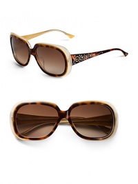 THE LOOKRounded rectangle framesVariegated, ombre handmade acetate framesEtched swirl design and Austrian crystals on temples and tipsTHE COLORTopaz with brown gradient lensORIGINImported THE LOOKRounded rectangle framesVariegated, ombre handmade acetate framesEtched swirl design and Austrian crystals on temples and tipsTHE COLORTopaz with brown gradient lensORIGINImported