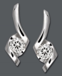 Aesthetically appealing. Sirena's artistic drop earrings feature a chic, 80s-inspired cut accented by sparkling, round-cut diamonds (1/4 ct. t.w.). Set in 14k white gold. Approximate drop: 1/2 inch.