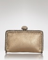 Sparkling crystals feel coolly edgy on this Clara Kasavina clutch. Gritty and glam at once, its a match for skyscraper heels and a model-off-duty attitude.