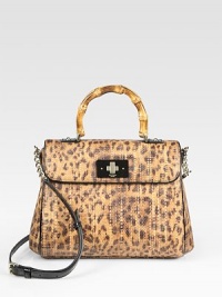 Leopard-printed raffia mixes with bamboo and patent leather accents for an instantly chic flap-top design. Bamboo top handle, 4¼ dropAdjustable detachable patent leather shoulder strap, 18½-21 dropTurnlock flap closureProtective metal feetOne inside zip pocketTwo inside open pocketsFully lined10¼W X 8H X 3DImported Leopard-printed raffia mixes with bamboo and patent leather accents for an instantly chic flap-top design. Bamboo top handle, 4¼ dropAdjustable detachable patent leather shoulder strap, 18½-21 dropTurnlock flap closureProtective metal feetOne inside zip pocketTwo inside open pocketsFully lined10¼W X 8H X 3DImported