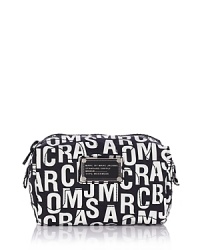 This cosmetics case with a jumble-print MARC BY MARC JACOBS logo lends whimsical cool to your favorite makeup essentials. Crafted in printed nylon with tonal logo stitching detail. Top-zip closure. Logo lining. This cosmetics case with a jumble-print MARC BY MARC JACOBS logo lends whimsical cool to your favorite makeup essentials. Crafted in printed nylon with tonal logo stitching detail. Top-zip closure. Logo lining.