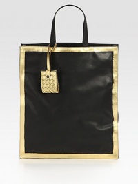 This smooth leather style is simply chic with contrast metallic leather border and a woven hang tag.Top handle, 5½ dropOpen topOne inside zip pocketOne inside open pocketSuede lining13W X 15H X 2½DMade in Italy This smooth leather style is simply chic with contrast metallic leather border and a woven hang tag.Top handle, 5½ dropOpen topOne inside zip pocketOne inside open pocketSuede lining13W X 15H X 2½DMade in Italy