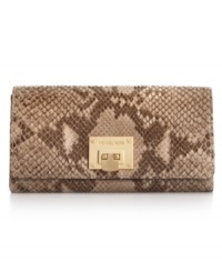 Get organized in the most exotic way with this posh, python-embossed leather carryall from MICHAEL Micahel Kors. Ideally sized to tuck under an arm or slip inside a handbag, it boasts plenty of pockets and compartments for all the essentials. Get organized in the most exotic way with this posh, python-embossed leather carryall from MICHAEL Micahel Kors. Ideally sized to tuck under an arm or slip inside a handbag, it boasts plenty of pockets and compartments for all the essentials.