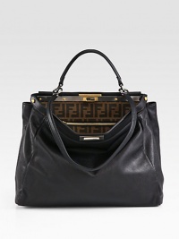 Fine Italian leather with a structured silhouette and a detachable shoulder strap. Top handle, 5 dropDetachable shoulder strap, 12½ dropTurnlock closureMetal feetTwo inner compartmentsOne inside zip pocketOne inside open pocketFully lined15W X 13H X 7DMade in Italy Fine Italian leather with a structured silhouette and a detachable shoulder strap. Top handle, 5 dropDetachable shoulder strap, 12½ dropTurnlock closureMetal feetTwo inner compartmentsOne inside zip pocketOne inside open pocketFully lined15W X 13H X 7DMade in Italy