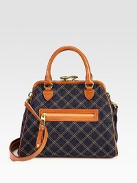 Rich leather pairs beautifully with quilted denim in this lady-like design with a classic kiss-lock closure. Detachable leather shoulder strap, 17½ dropKiss-lock closureOne outside zip pocketOne inside zip pocketTwo inside open pocketsCotton lining12½W X 9H X 1½DMade in Italy Rich leather pairs beautifully with quilted denim in this lady-like design with a classic kiss-lock closure. Detachable leather shoulder strap, 17½ dropKiss-lock closureOne outside zip pocketOne inside zip pocketTwo inside open pocketsCotton lining12½W X 9H X 1½DMade in Italy