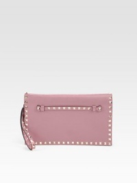 Luxuriously smooth leather accented in shiny pyramid studs with a versatile wrist strap.Wrist strap, 1 dropWristlet, 6 dropMagnetic snap flap closureThree inner compartmentsOne inside zip pocketFully lined11W X 6½H X 1DMade in Italy Luxuriously smooth leather accented in shiny pyramid studs with a versatile wrist strap.Wrist strap, 1 dropWristlet, 6 dropMagnetic snap flap closureThree inner compartmentsOne inside zip pocketFully lined11W X 6½H X 1DMade in Italy