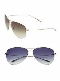 Sporty, double-bridge, semi-rimless titanium sunglass is crafted with lightweight titanium temples and metal front in a classic aviator shape. Available in gold with olive gradient lens and silver with grey gradient lens. Silicone nose pads Temple tips provide additional comfort and fit Gradient lenses are a six-base lens curve 100% UV protection Imported Sporty, double-bridge, semi-rimless titanium sunglass is crafted with lightweight titanium temples and metal front in a classic aviator shape. Available in gold with olive gradient lens and silver with grey gradient lens. Silicone nose pads Temple tips provide additional comfort and fit Gradient lenses are a six-base lens curve 100% UV protection Imported