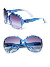 THE LOOKOversized round silhouetteAcetate and polycarbonate framesMetal logo at templesUV protectionSignature case includedTHE COLORTranslucent blue frames with grey gradient lensesORIGINMade in France THE LOOKOversized round silhouetteAcetate and polycarbonate framesMetal logo at templesUV protectionSignature case includedTHE COLORTranslucent blue frames with grey gradient lensesORIGINMade in France