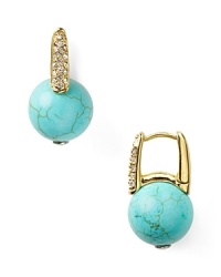 Take your lobes on a tropical vacation and opt for MICHAEL Michael Kors' turquoise earrings. The bright baubles punch up neutral palettes and all-black with island-inspired color. Take your lobes on a tropical vacation and opt for MICHAEL Michael Kors' turquoise earrings. The bright baubles punch up neutral palettes and all-black with island-inspired color.