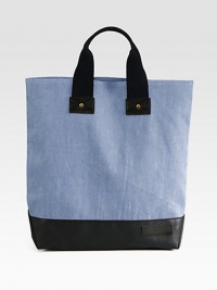 Canvas pairs with rich leather in this roomy top-handle carryall. Cotton double top handles, 3½ dropOne inside pocketFully lined13W X 15H X 3½DImported Canvas pairs with rich leather in this roomy top-handle carryall. Cotton double top handles, 3½ dropOne inside pocketFully lined13W X 15H X 3½DImported