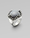 Organic and elegant, polished gray agate cabochon is richly framed in sterling silver beads.Gray agate Sterling silver Length, about 1 Imported