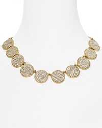 Bright for now, perfect for every occasion, this kate spade new york collar necklace is effortlessly glam, cast in gold plated metal with striking circular stations. Bright for now, perfect for every occasion, this kate spade new york collar necklace is effortlessly glam, cast in gold plated metal with striking circular stations.
