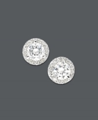 Sweeten any look with a touch of sparkle. These stunning stud earrings highlight round-cut diamonds encircled by halos of round-cut diamond accents (2 ct. t.w.). Crafted in 14k white gold. Approximate diameter: 6 mm. Sweeten any look with a touch of sparkle. These stunning stud earrings highlight round-cut diamonds encircled by halos of round-cut diamond accents (2 ct. t.w.). Crafted in 14k white gold. Approximate diameter: 6 mm.