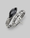From the Jewels Verne Collection. A coil of crosshatched sterling silver with a faceted grey cat's eye and quartz stone.Cat's eye Quartz Sterling silver Diameter, about 2½ Imported 