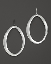Large oval hoop earrings in sterling silver with a subtle wavelike effect. Designed by Ippolita. Large oval hoop earrings in sterling silver with a subtle wavelike effect. Designed by Ippolita.