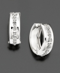 Diamond accents are set within wide, gleaming hoops of 14k white gold. Diamond accents are set within wide, gleaming hoops of 14k white gold.