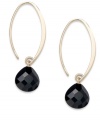 Elevate your style with smooth swoops. These unique hoop earrings highlight faceted onyx beads at the ends (13-3/4 ct. t.w.). Set in 14k gold. Approximate drop: 1-1/2 inches.