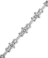 Decorate your wrist with floral elegance. Charter Club bracelet features glittering crystal flowers set in silver tone mixed metal. Approximate length: 7 inches. Decorate your wrist with floral elegance. Charter Club bracelet features glittering crystal flowers set in silver tone mixed metal. Approximate length: 7 inches.