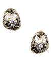 A study in earth science. The unique shape and glittering blend of cubic zirconia (1-3/10 ct. t.w.) and marcasite on Judith Jack's button stud earrings adds an organic touch to any look. Post backing set in sterling silver. Approximate diameter: 3/8 inch.