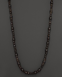 Smokey quartz is accented with 14K yellow gold rondels in this endless necklace from Lara Gold for LTC. Smokey quartz is accented with 14K yellow gold rondels in this endless necklace from Lara Gold for LTC.