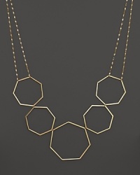 A modern statement necklace in yellow gold from Lana. A modern statement necklace in yellow gold from Lana.