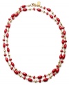 Circles of coral. Lauren by Ralph Lauren's gold tone mixed metal necklace features multiple stones of reconstituted coral. Approximate length: 36 inches.