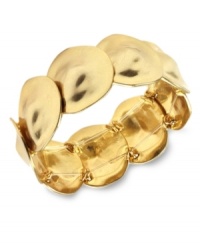 Set your style into circular motion. Bracelet by Jones New York features shiny overlapping discs crafted in gold tone mixed metal. Bracelet stretches to fit wrist. Approximate diameter: 2-1/4 inches. Set your style into circular motion. Bracelet by Jones New York features shiny overlapping discs crafted in gold tone mixed metal. Bracelet stretches to fit wrist. Approximate diameter: 2-1/4 inches.