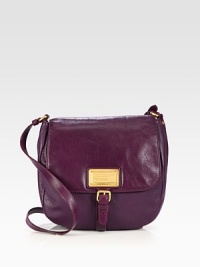 A subtle blend of luxurious pebbled leather and smooth leather with radiant hardware.Adjustable shoulder strap, 17½-22½ dropMagnetic snap flap closureOne inside zip pocketTwo inside open pocketsFully lined10½W X 11H X 3DImported A subtle blend of luxurious pebbled leather and smooth leather with radiant hardware.Adjustable shoulder strap, 17½-22½ dropMagnetic snap flap closureOne inside zip pocketTwo inside open pocketsFully lined10½W X 11H X 3DImported