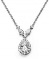 Remarkable style, memorable shine. This CRISLU pendant features round and pear-cut cubic zirconias (5-1/4 ct. t.w.) set in platinum over sterling silver. Approximate length: 16 inches + 2-inch extender. Approximate drop: 1 inch.