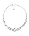 Show off your unique sense of style in Swarovski's distinctive rhinestone collar necklace, embellished with organically-shaped crystals. Crafted in silver tone mixed metal. Approximate length: 15 inches.