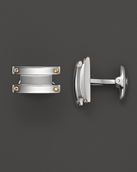 Bright 18K. gold enhances the gleam of sterling silver. By Dolan & Bullock. From the Stainless Steel and 18k Collection. Bright 18K. gold enhances the gleam of sterling silver. By Dolan & Bullock. From the Stainless Steel and 18k Collection.