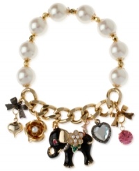 Half stretch, full-on fun. Betsey Johnson's multi-charm bracelet is crafted from antique gold-tone mixed metal and glass pearls, featuring whimsical pieces with glittering accents, such as an elephant and flowers. Item comes packaged in a signature Betsey Johnson Gift Box. Approximate length: 7-1/2 inches. Half stretch, full-on fun. Betsey Johnson's multi-charm bracelet is crafted from antique gold-tone mixed metal and glass pearls, featuring whimsical pieces with glittering accents, such as an elephant and flowers. Item comes packaged in a signature Betsey Johnson Gift Box. Approximate length: 7-1/2 inches.