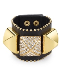 Punk-inspired style finds its pretty side with this edgy black leather cuff from Juicy Couture, which is detailed with gleaming pyramid studs. Punk-inspired style finds its pretty side with this edgy black leather cuff from Juicy Couture, which is detailed with gleaming pyramid studs.