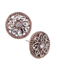 Complete your whole look with a pair of sparkling studs. Perfect for day or night, these 2028 earrings feature a unique, filigree, silver and rose gold tone mixed metal setting with a round-cut crystal center stone. Approximate diameter: 3/4 inch. Complete your whole look with a pair of sparkling studs. Perfect for day or night, these 2028 earrings feature a unique, filigree, silver and rose gold tone mixed metal setting with a round-cut crystal center stone. Approximate diameter: 3/4 inch.