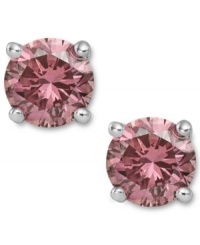 Perfection in pink. These sparkling stud earrings feature round-cut pink diamonds (1/2 ct. t.w.) in a four-prong setting of 14k white gold. Approximate diameter: 1/5 inch. Perfection in pink. These sparkling stud earrings feature round-cut pink diamonds (1/2 ct. t.w.) in a four-prong setting of 14k white gold. Approximate diameter: 1/5 inch.